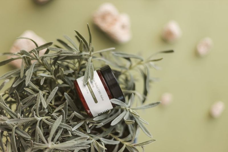Salve jar among dried herbs